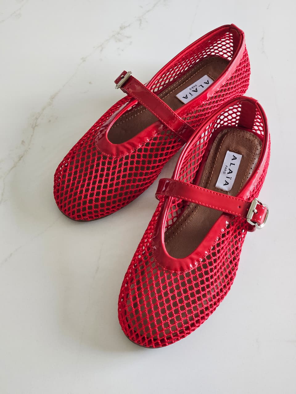 ALAÏ RED FISHNET BALLET FLATS